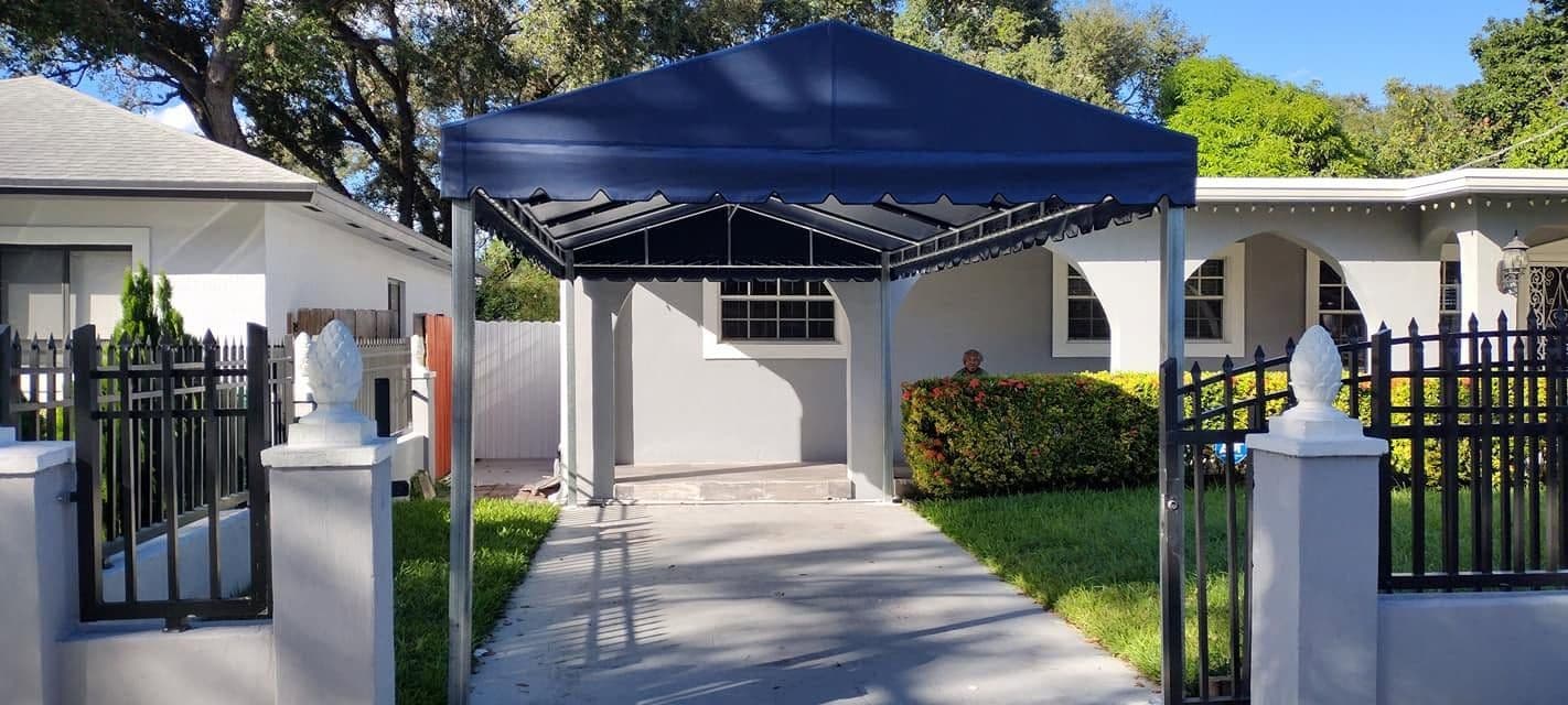 Navy blue entrance canopy over a residential walkway